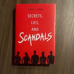 Open Book with Black and Red Cover